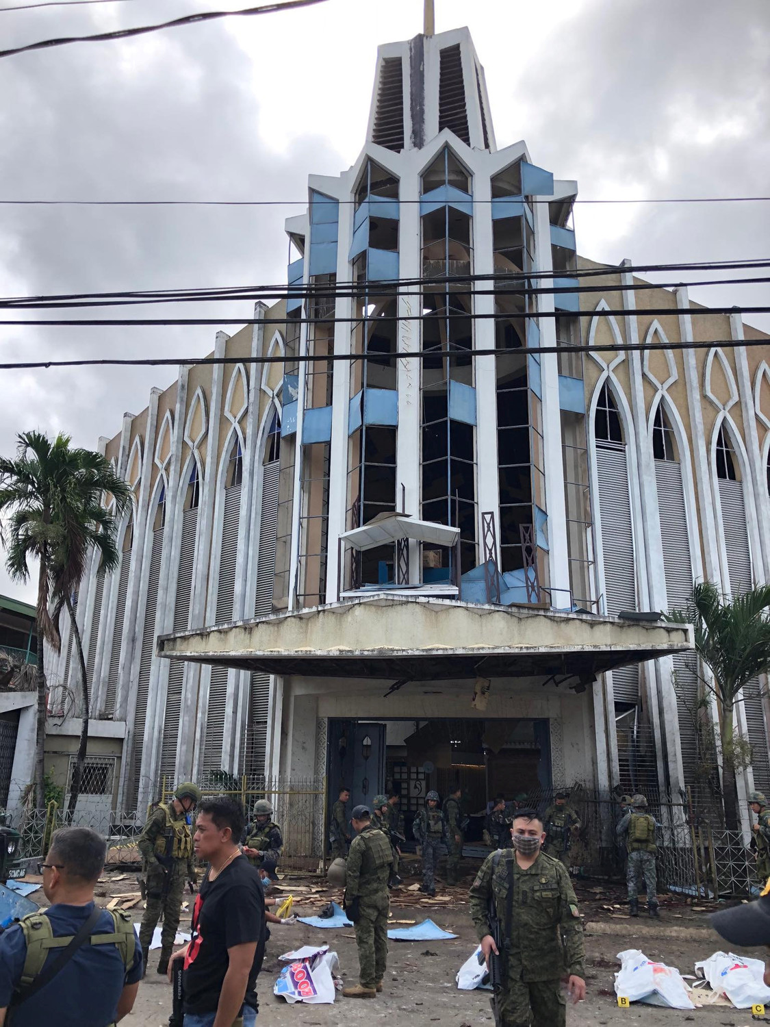 Philippine Army members secure the area outside the Cathedral of Our Lady of Mount Carmel Jan. 27, 2019, on the southern Philippine island of Jolo.